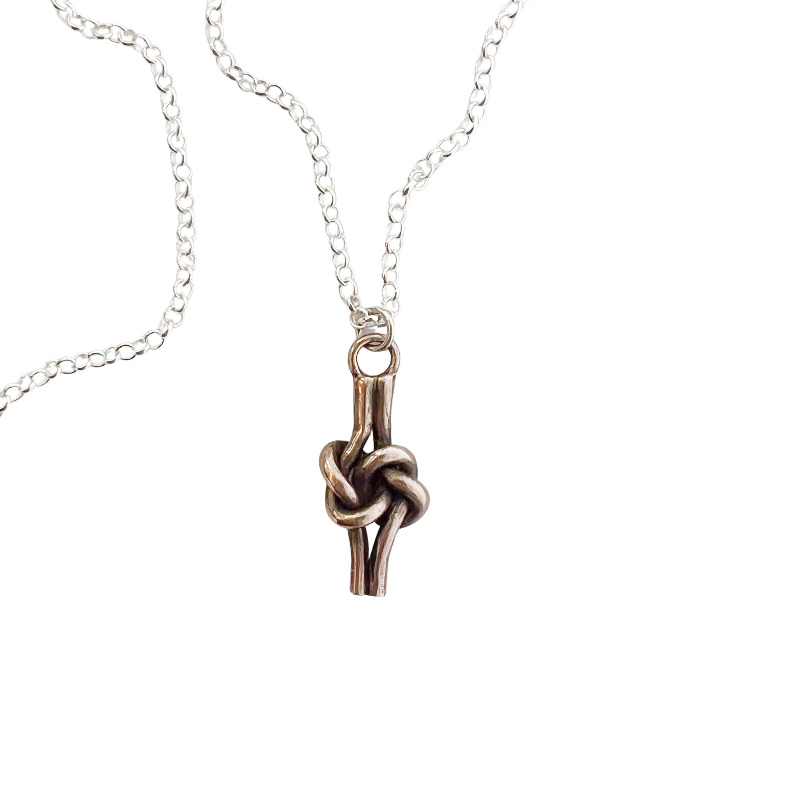 Bronze Love Knot Pendant on sterling silver chain.