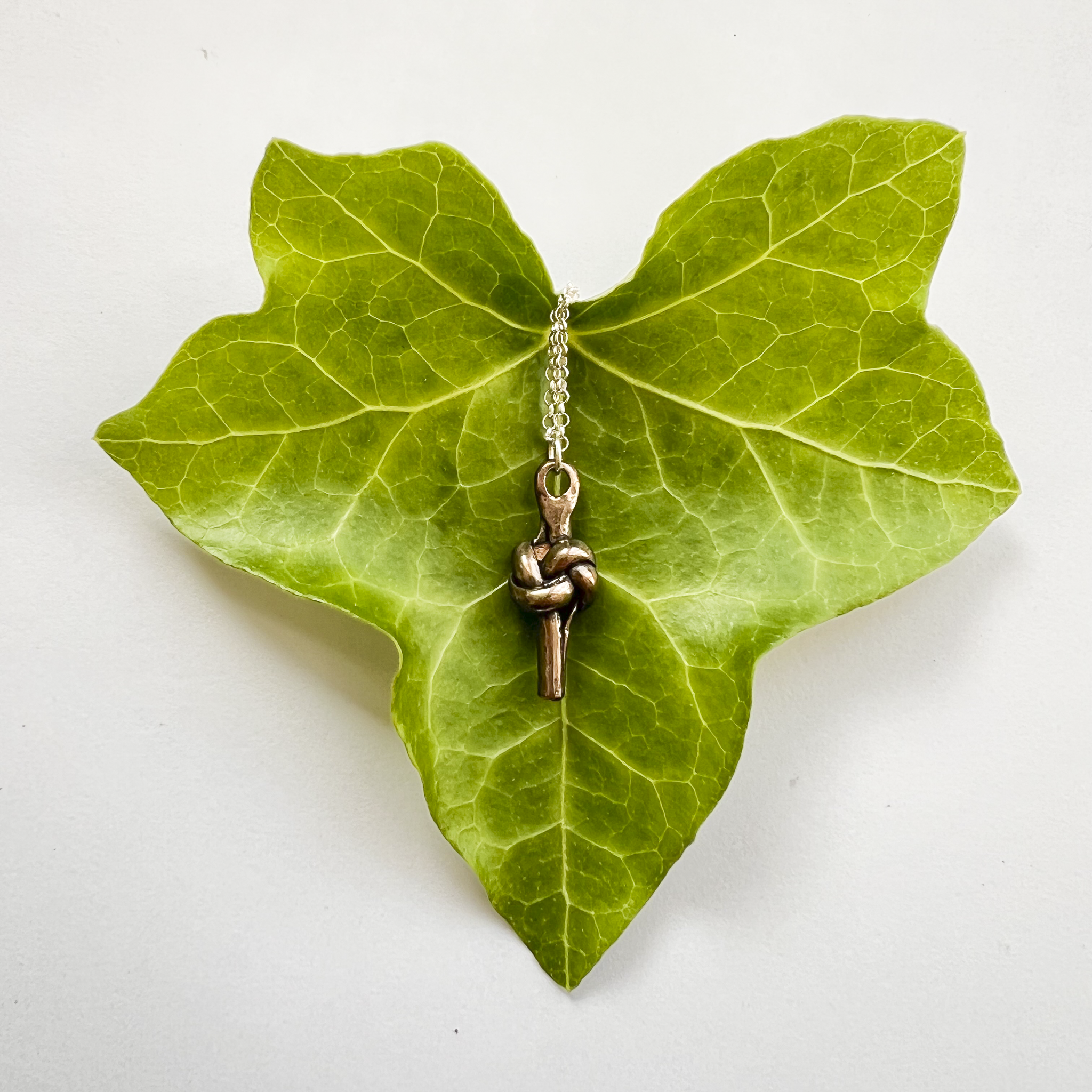 Puffy Bronze Love Knot Pendant – 8th Anniversary Gift for Her