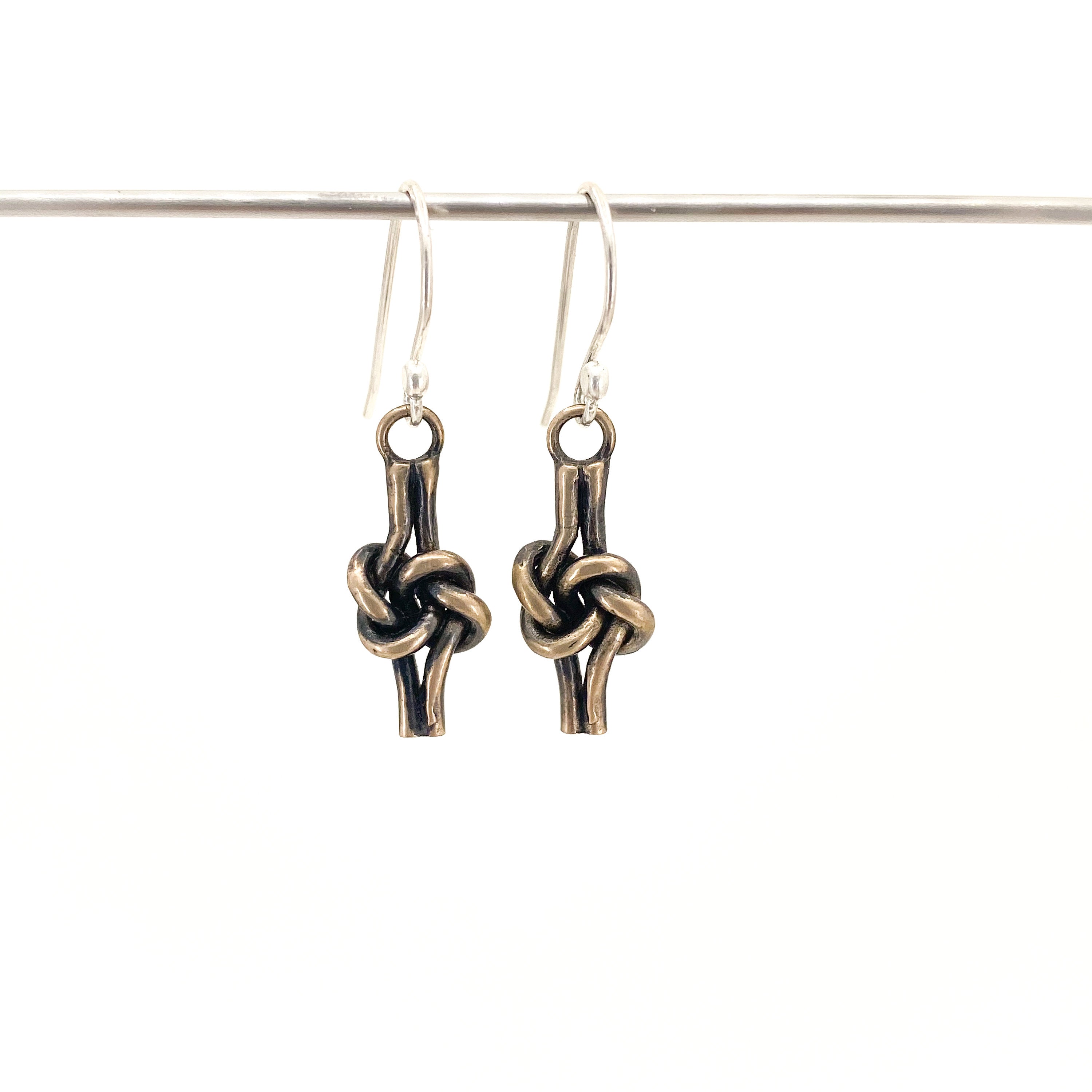 Bronze love knot earrings on sterling silver ear wires. 8th or 19th anniversary gift