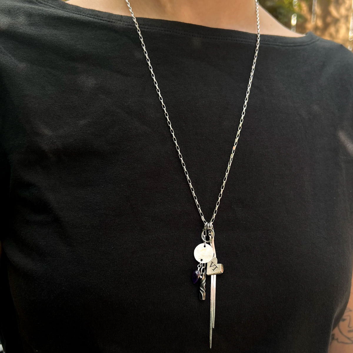 Charm necklace with stainless chain, iron heart charm with VI engraved, amethyst gem drop and chain tassel.