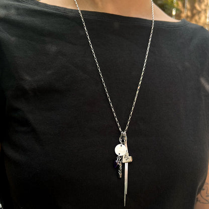 Charm necklace with stainless chain, iron heart charm with VI engraved, amethyst gem drop and chain tassel.