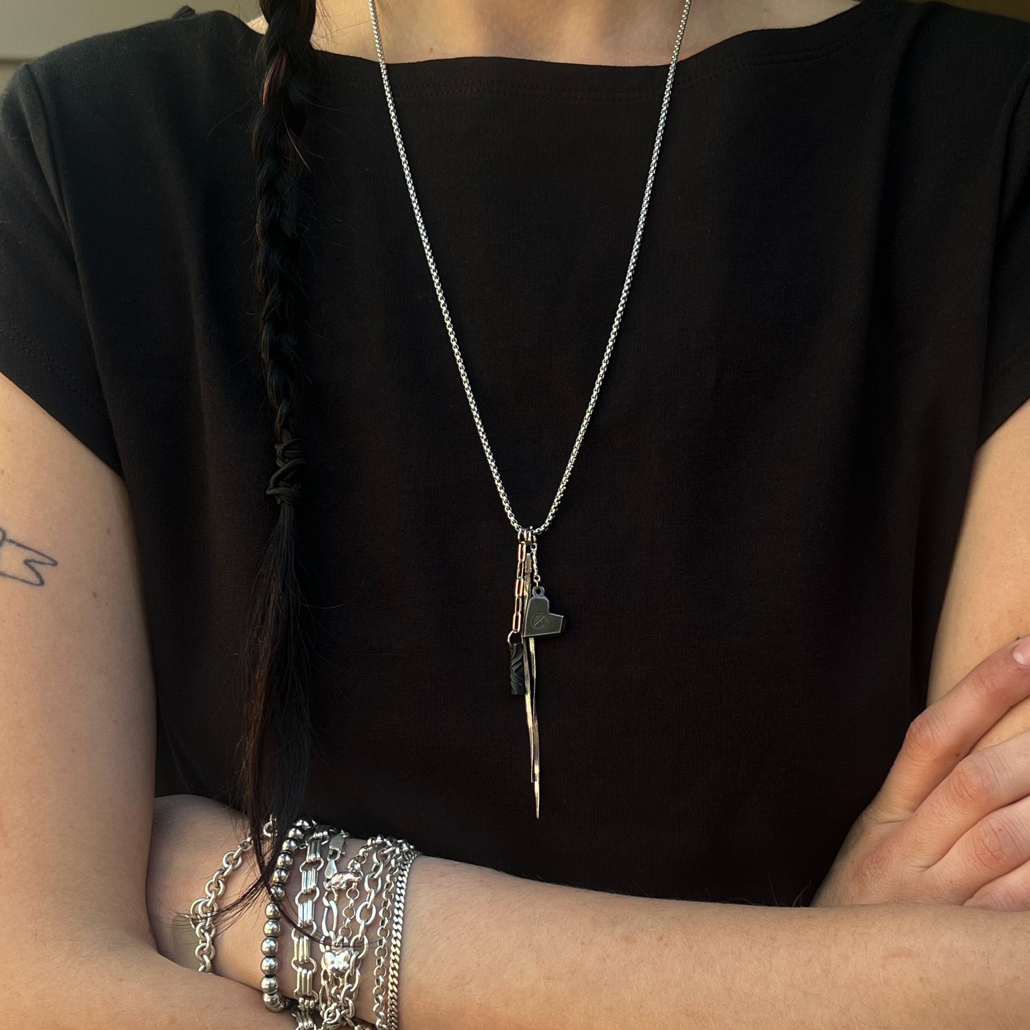 Charms on long stainless chain for 6th anniversary symbolism.