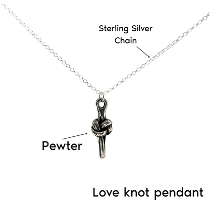 Silver necklace with a pendant shaped like a love knot, shown on a white background with text labels pointing to the sterling silver chain and the pendant.