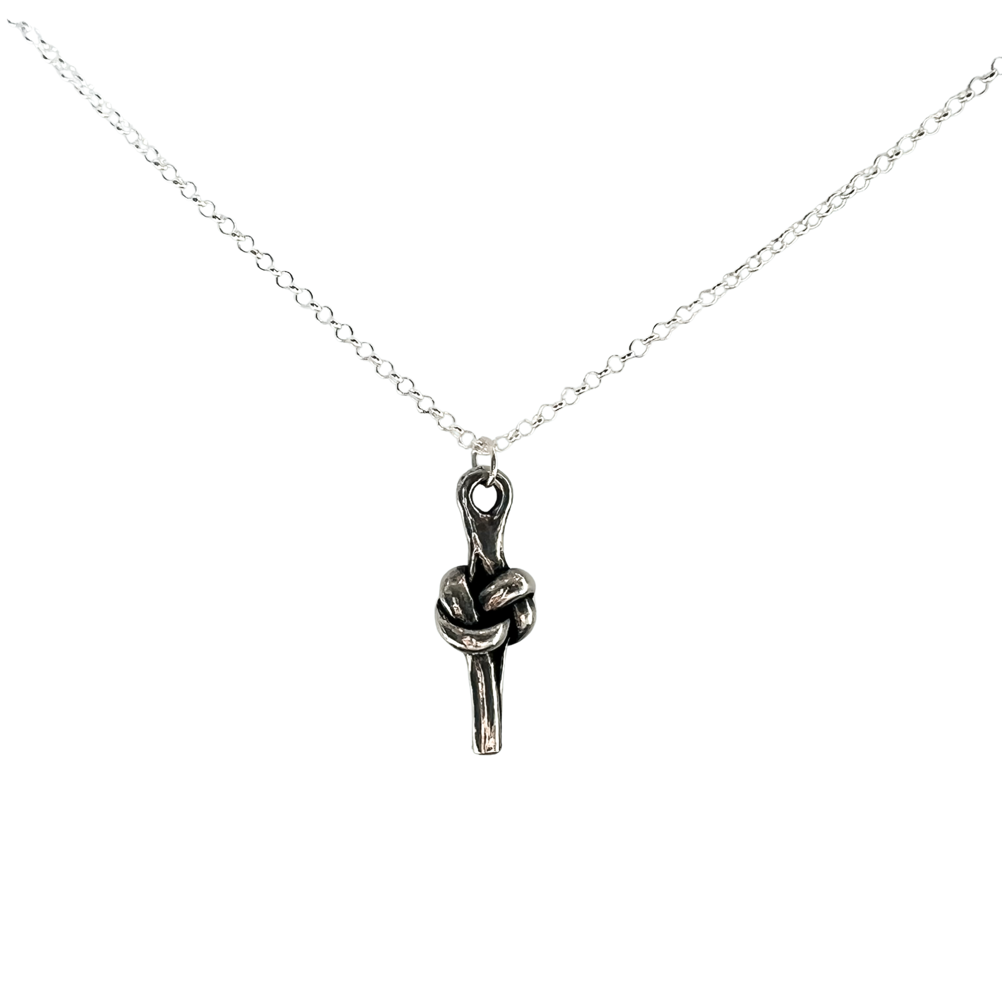 A silver chain necklace featuring a pewter pendant of a love knot, displayed against a solid white background.