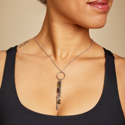 Bronze twist and colorful tourmaline necklace on model to show 8th anniversary gift idea for wife.