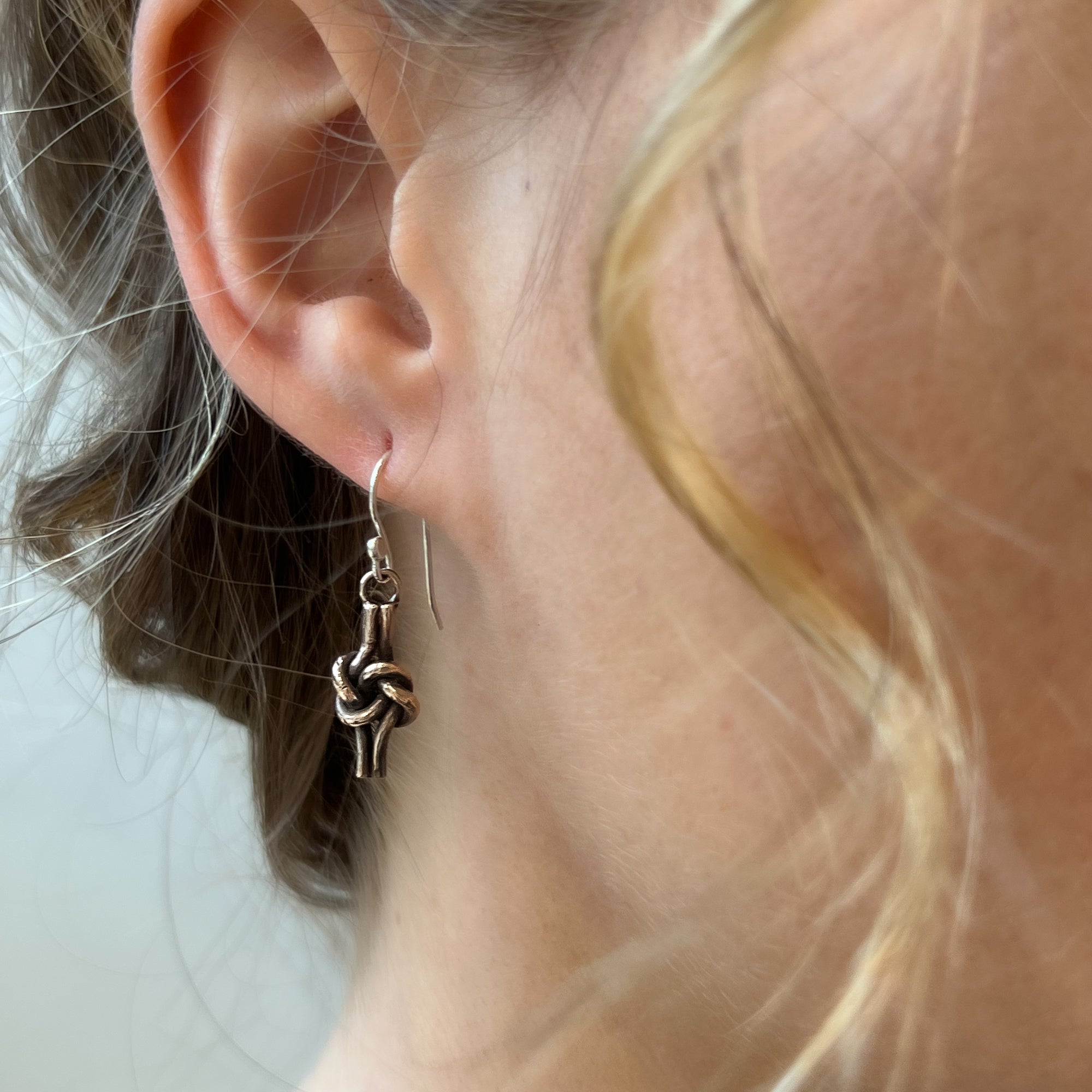 Bronze Love Knot Earrings by Steel Toe Studios for bronze anniversary gift.