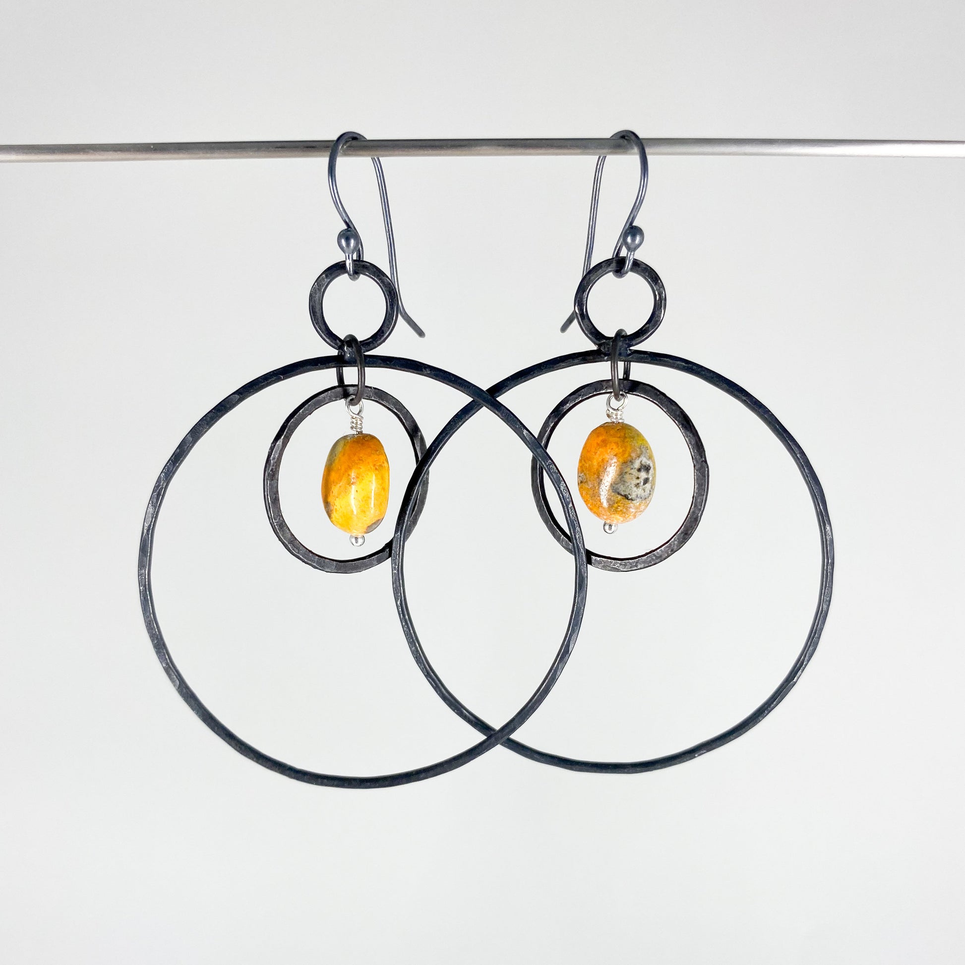 iron hoop earrings lightweight with bumblebee jasper, dangle hoop earrings in iron, jasper earrings, hand forged earrings
